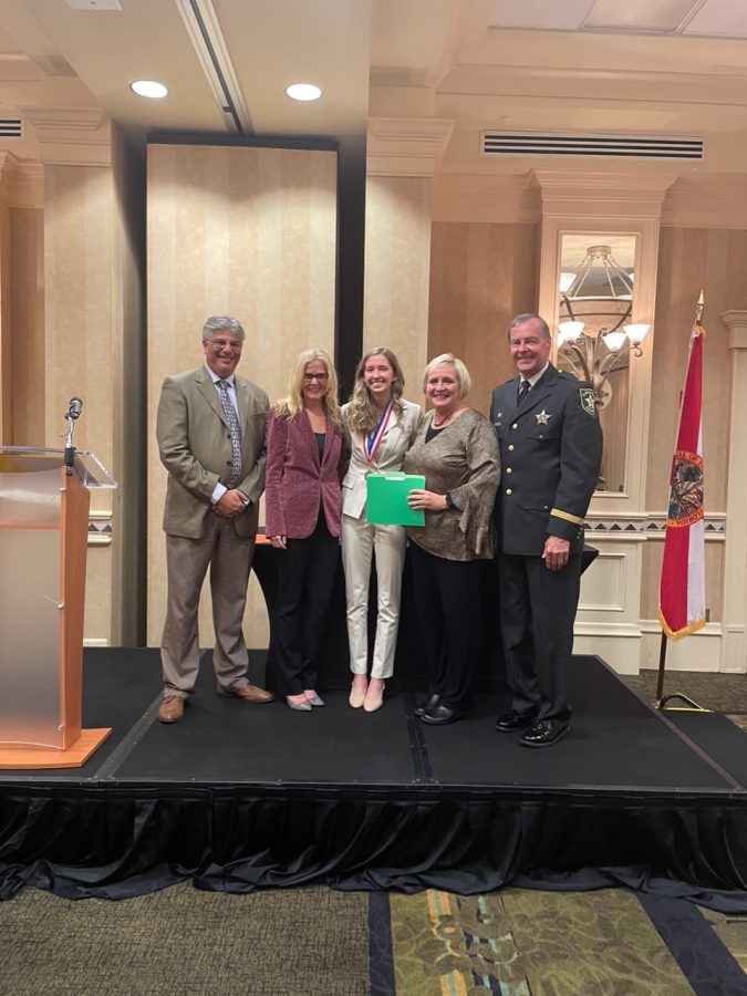 Pictured from left to right, Keith Scalia, Ms. Scott, Kathryn Barry, Superintendent of Collier County Public Schools Kamela Patton, and Collier County Sheriff Kevin J Rambosk 