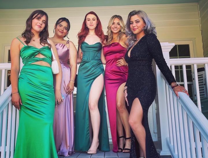 Astrid F., Bella B. and their friends before prom. 
