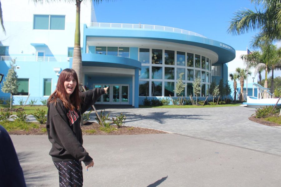 Foreign exchange student, Astrid Fossoe, outside of Marco Island Academy during Creative Photography. 