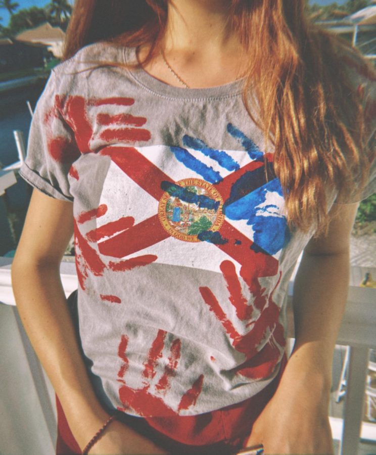 Writer, Annabelle Frazer, models a shirt representing her home state of Florida.