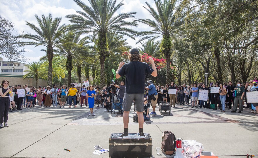 Thousands+of+students+from+USF+and+other+colleges+participate+in+a+campus-wide+walkout+to+protest+numerous+efforts+by+the+DeSantis+administration+to+change+school+curriculums.+
