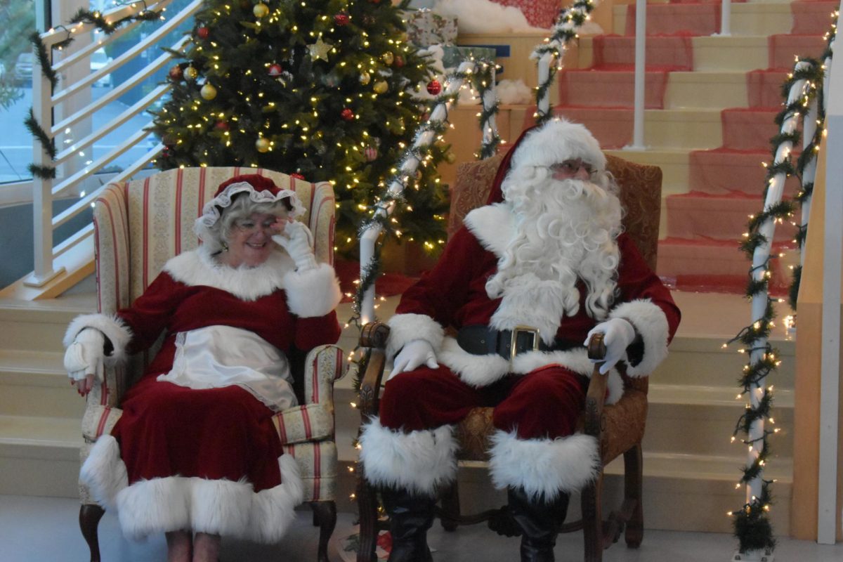 Mr. and Mrs. Claus happily waiting to  greet the children. 