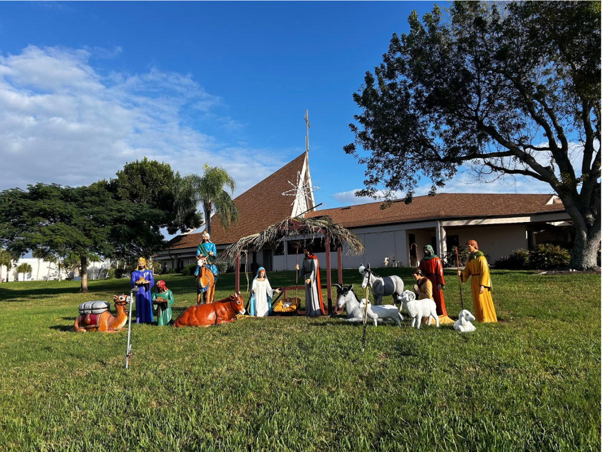 Featured is the nativity scene stationed in front of the Marco Lutheran Church