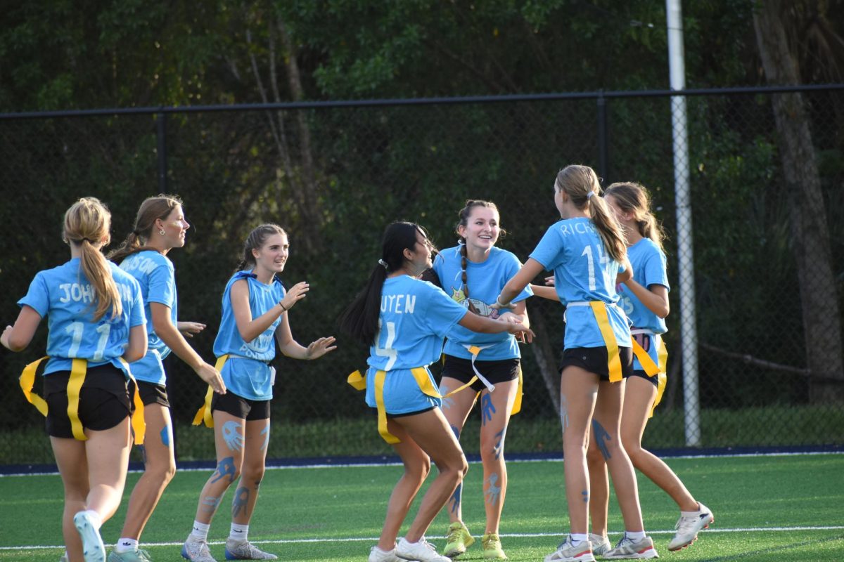 Blue team getting ready and hyped to play a great game of flag football.