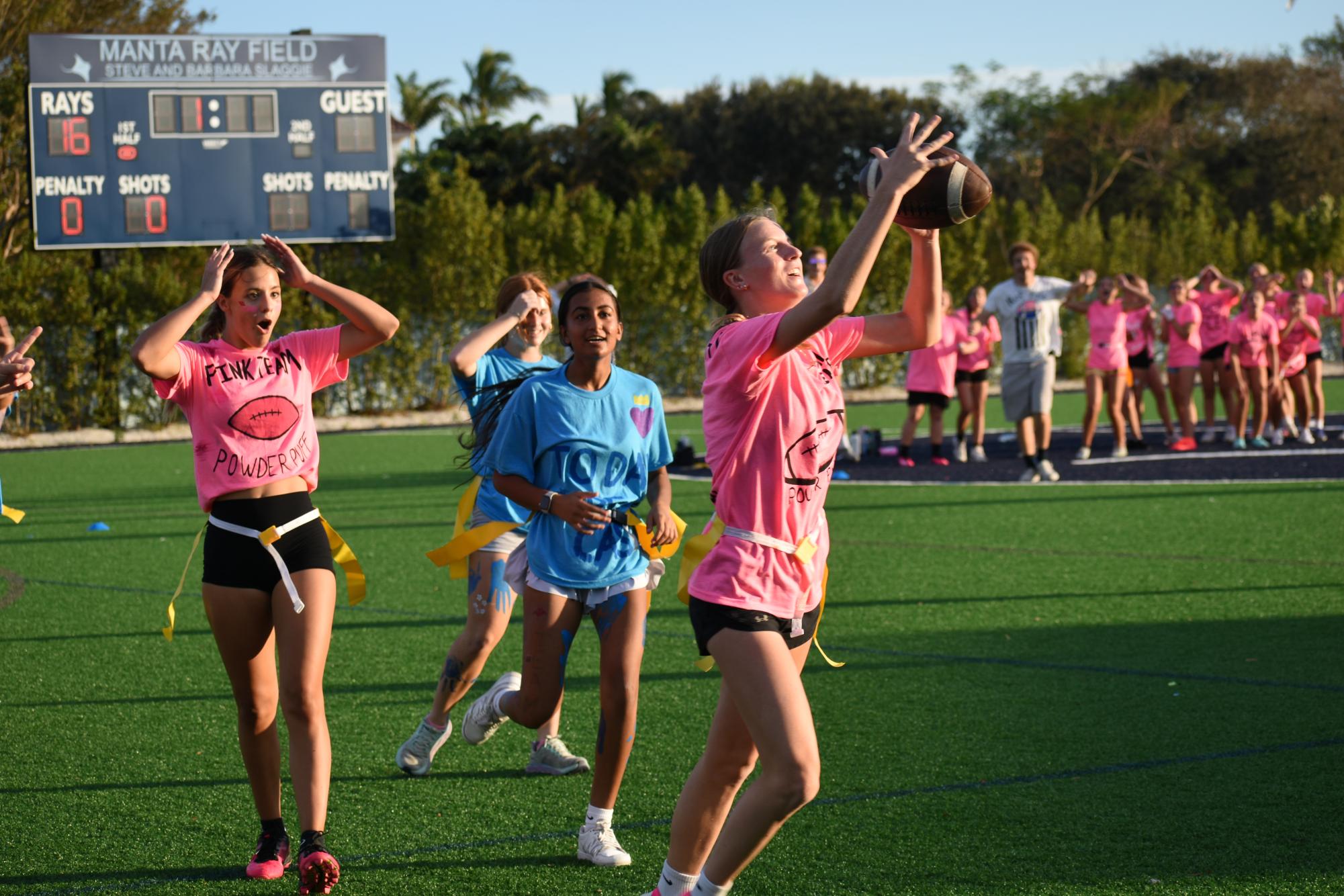 Janie Cartwright catching an amazing throw while Adyson Clemons is still in shock.