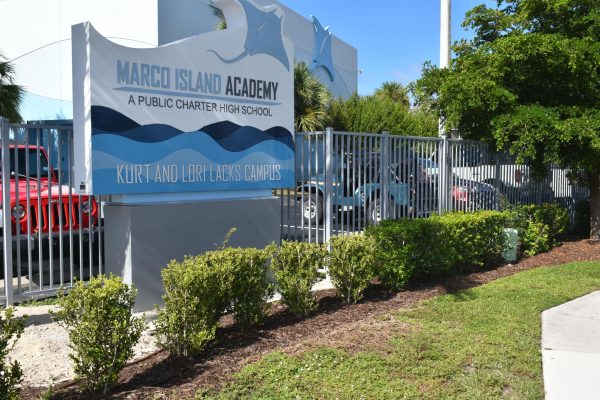The MIA entrance sign with the new fence behind it. 