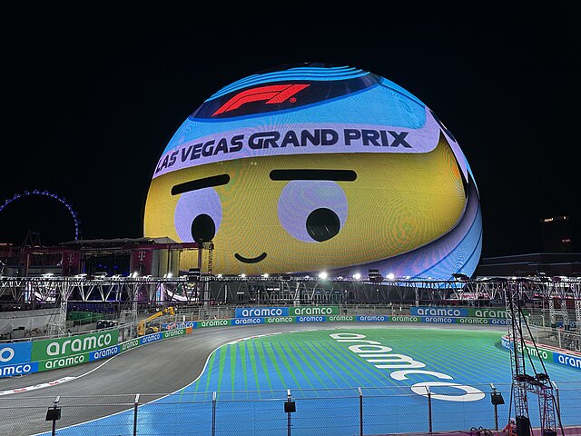 Photo credit to  A photo taken at the 2024 Las Vegas Grand Prix, featuring the Sphere (displaying a graphic of Orbi) and the Las Vegas Street Circuit's seventh and eighth turns. via Wikipedia Commons under Wikipedia Commons License