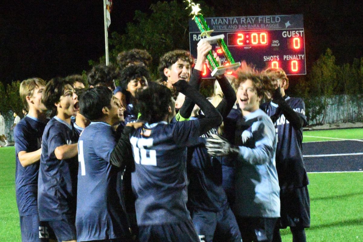 Marco Island Academy celebrating their PCAC victory over Mason Classical Academy.