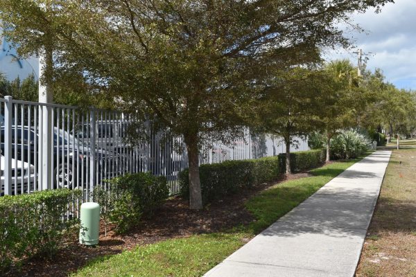 The new fence outside of MIA's perimeter from the sidewalk.