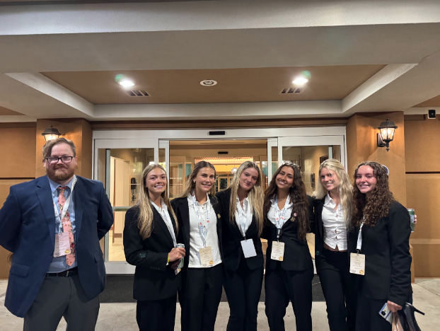 HOSA members and club adviser, Mr. Kraft together after the conference.